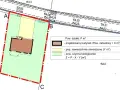 Projekt decyzji o warunkach zabudowy przedstawia działkę z projektowanym budynkiem, nawierzchniami utwardzonymi i powierzchnią czynną biologiczną.